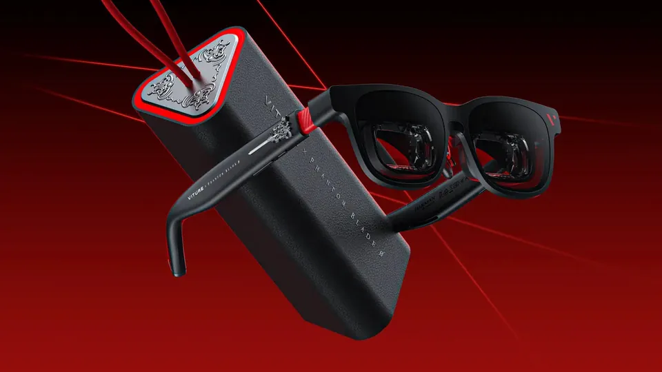 Black VITURE Phantom Beast glasses with red and silver Phantom Blade Zero details, resting beside the triangular black leather case with a red cord, on a red background